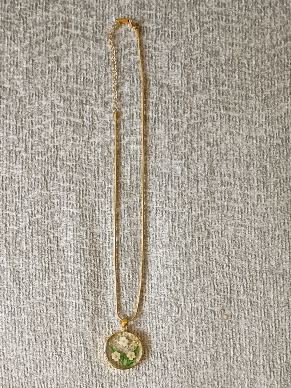 Gold Floral Pendant Necklace with White and Green Accents